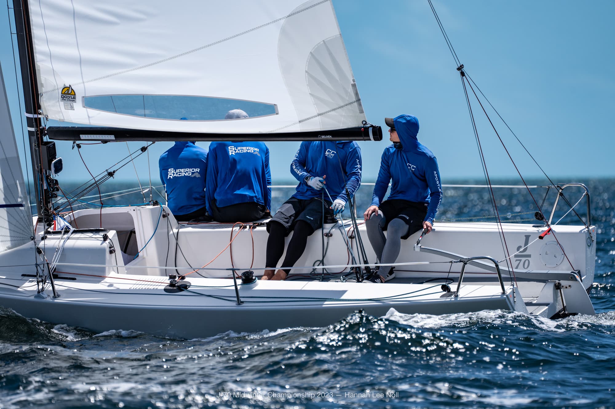 Four people on a sailboat